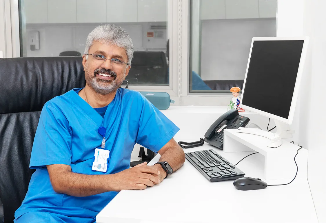 Dr. Saji John Mathews
